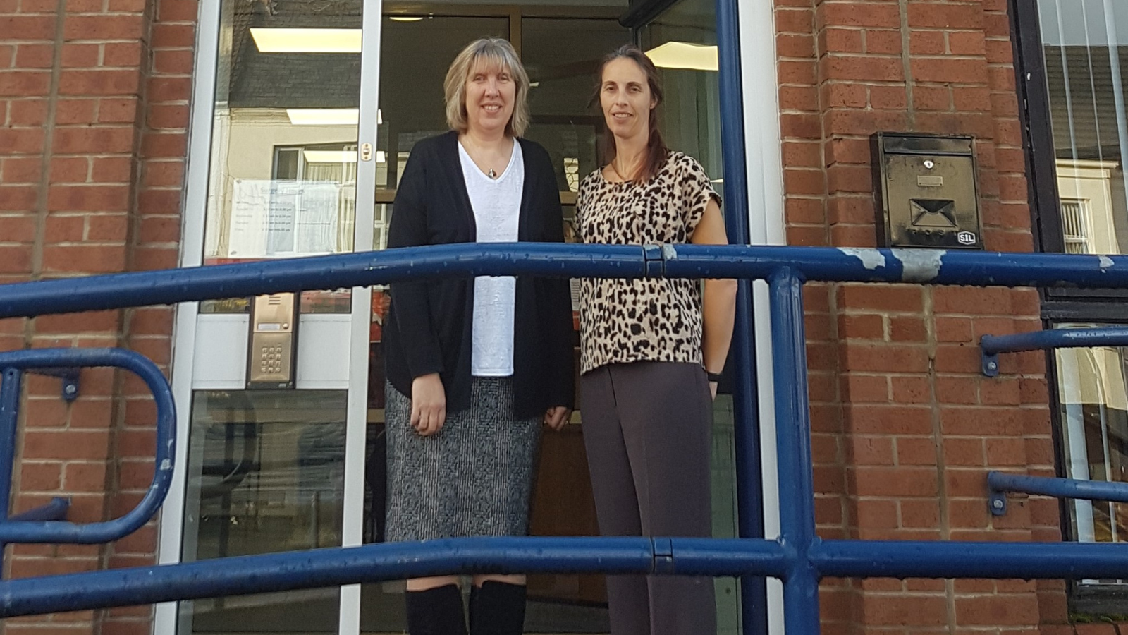 A photo of Karen and Tracy standing out the front of Heaton Road surgery.
