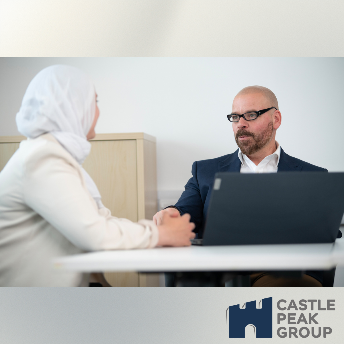 James speaking to a client