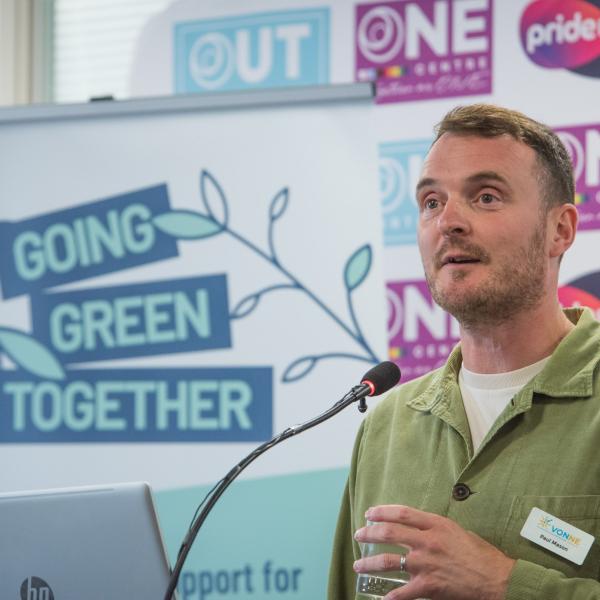 GGT Team member speaking at lectern 