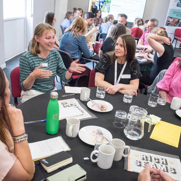 Round table of people in conversation